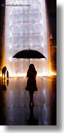 america, bricks, chicago, crown fountains, glow, illinois, jills, lights, materials, millenium park, nite, north america, rain, silhouettes, umbrellas, united states, vertical, weather, photograph