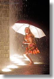 america, bricks, chicago, crown fountains, glow, illinois, jills, lights, materials, millenium park, nite, north america, rain, stooping, umbrellas, united states, vertical, weather, photograph