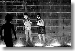 america, black and white, chicago, childrens, crown fountains, fountains, horizontal, illinois, millenium park, nite, north america, people, united states, water, photograph