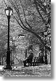 america, benches, black and white, central park, men, new york, new york city, north america, park, united states, vertical, photograph