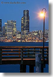 america, buildings, cityscapes, lamp posts, long exposure, nite, north america, pacific northwest, piers, seattle, structures, united states, vertical, washington, western usa, photograph