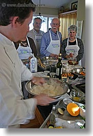 apron, clothes, cooking, cooks, foods, johns, men, people, personal, senior citizen, slow exposure, teaching, vertical, photograph